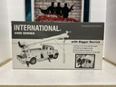 1/34 SCALE - FIRST GEAR INTERNATIONAL 4400 SERIES W/DIGGER DERRICK image