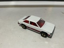 1/64 HOTWHEELS MATTEL CHEVY CITATION XII - 1980 MADE IN HONG KONG GOLD WHEELS image