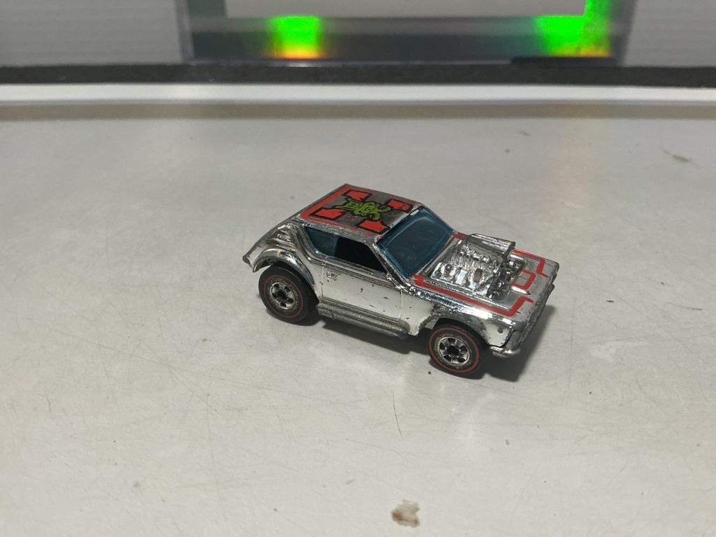 1/64 HOTWHEELS MATTEL - 1974 GREMLIN GRINDER SUPERCHROME RED LINE - HONG KONG image