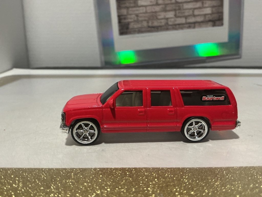 1/64 HOTWHEELS 1999 CHEVY SUBURBAN TEAM BAURTWELL - USED image
