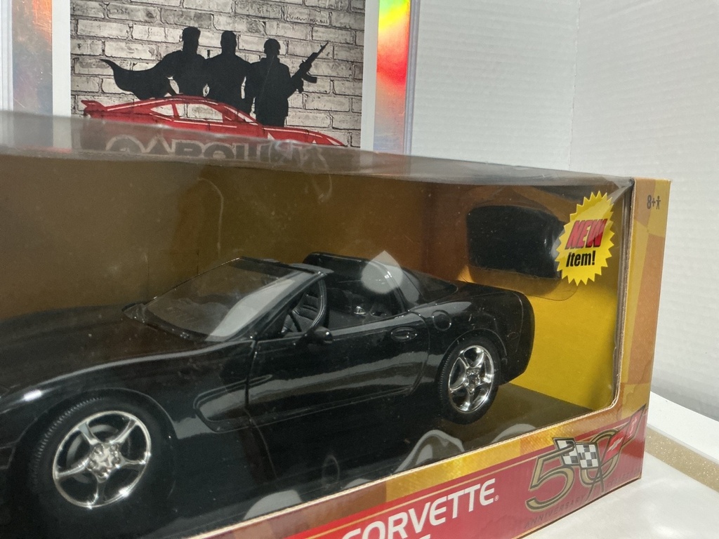 1:18 ERTL AMERICAN MUSCLE 2003 CORVETTE COUPE BLACK ON GRAY image