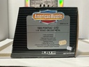 1:18 ERTL AMERICAN MUSCLE BLUE ON BLACK image