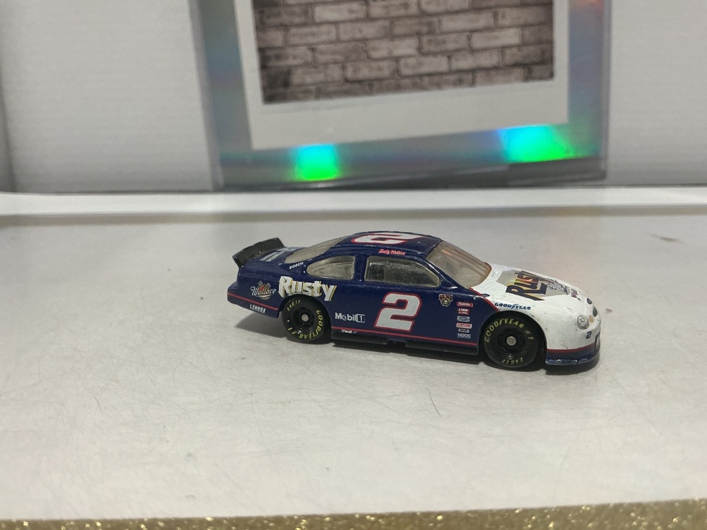 1/64 NASCAR WINNER’S CIRCLE RUSTY WALLACE'S 1998 FORD TAURUS [PAINT ON TIRE] image