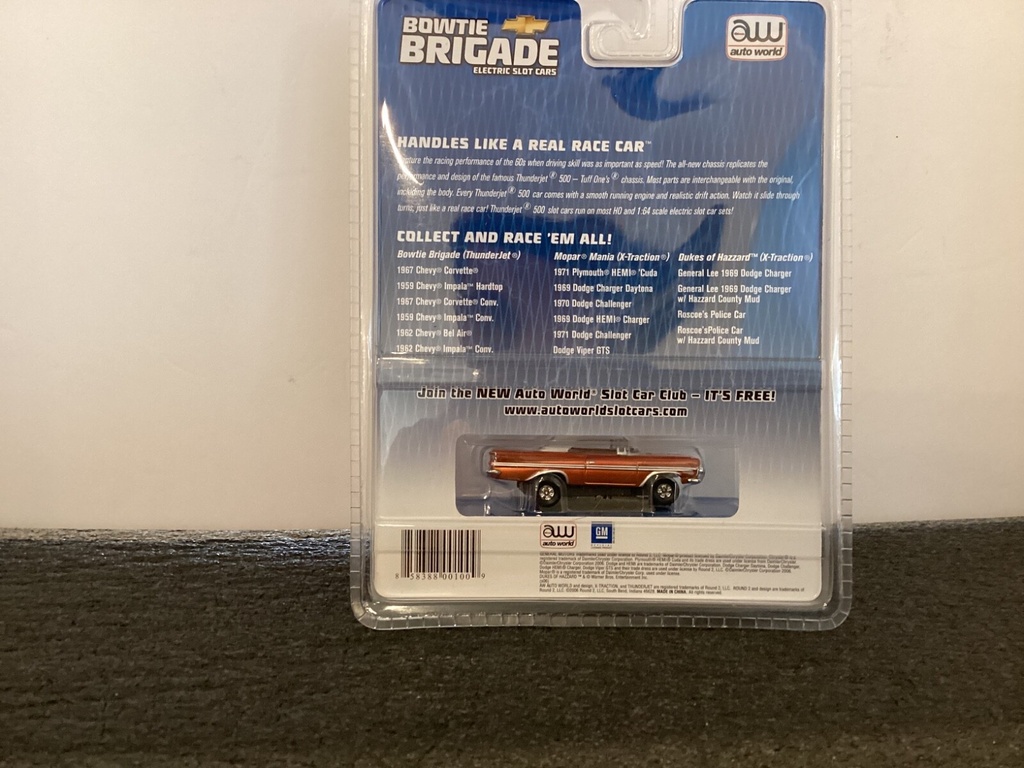 AUTOWORLD XTRACTION HO SLOT CAR 1962 CHEVY IMPALA CONV. (ORANGE) image