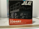 1/32 JLG MODEL 3394 RT ROUGH TERRAIN SCISSOR LIFT [PLASTIC TEAR] image