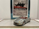 1/18: MAISTO PORSHE BOXLER SILVER ON RED image