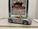 1/18: MAISTO PORSHE BOXLER SILVER ON RED image