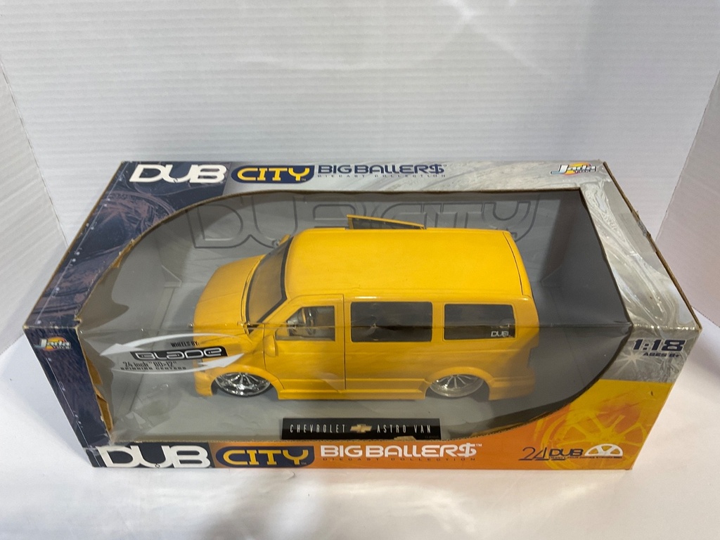 1:18 JADA TOYS DUB CITY (DISPLAYED) CHEVROLET ASTRO VAN YELLOW ON GREY image