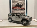 1/18: MAISTO HUMMER H2 SILVER ON GREY (MISSING ANTENNA) image