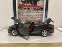 1/18: RACING CHAMPIONS ZOO4 PONTIAC GTO BLACK ON RED image