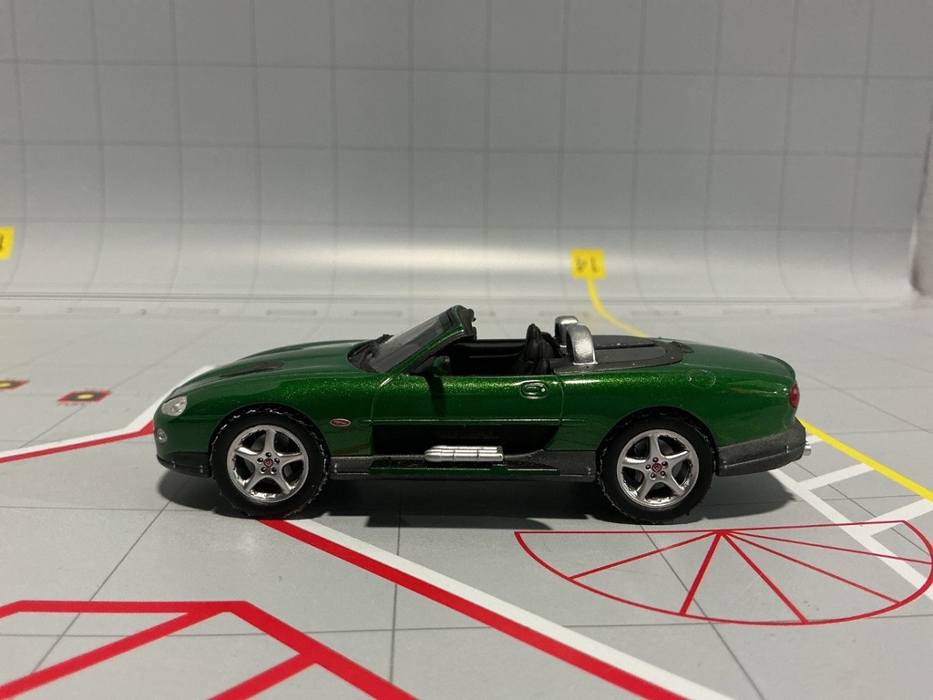 1:43 MINICHAMPS BOND COLLECTION JAGUAR XKR ROADSTER GREEN ON BLACK image
