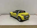 1/18: BURAGO ITALY SMART ROADSTER YELLOW ON RED image