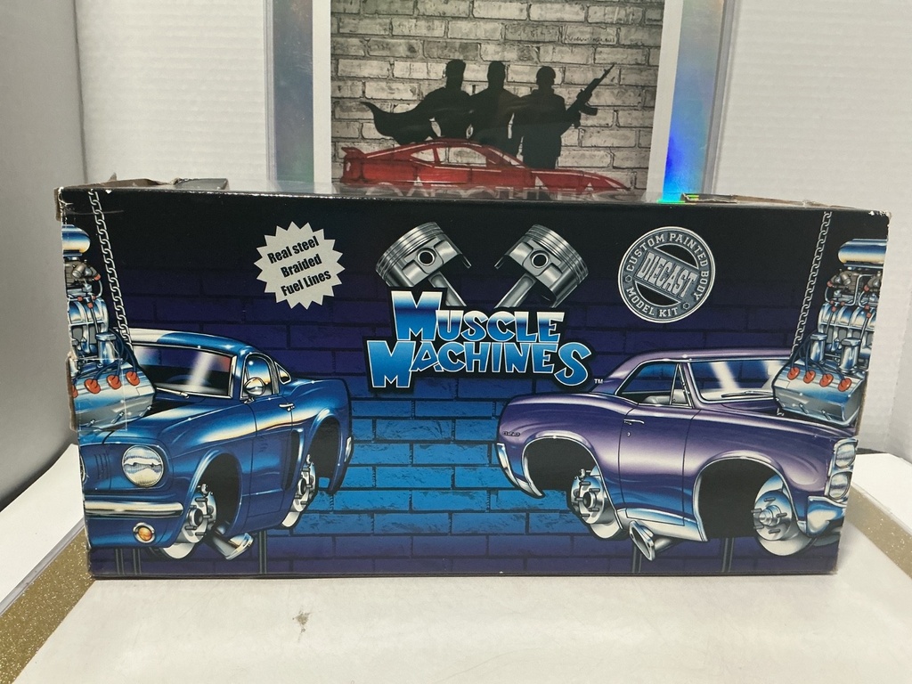 1/18: MUSCLE MACHINES WHITE W/ FLAMES ‘57 CHEVY image