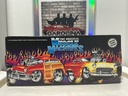 1/18: MUSCLE MACHINES PINK / WHITE ‘57 CHEVY [WATER DAMAGE TO BOX] image