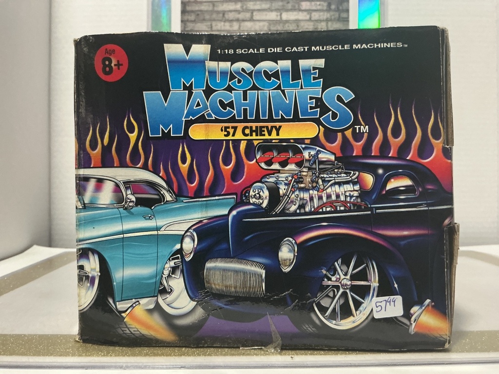1/18: MUSCLE MACHINES PINK / WHITE ‘57 CHEVY [WATER DAMAGE TO BOX] image