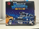 1/18: MUSCLE MACHINES RED WHITE AND BLUE ‘66 GTO [WATER DAMAGED BOX] image