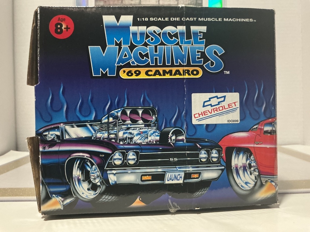 1/18: MUSCLE MACHINES ‘69 CAMARO RED WHITE AND BLUE image