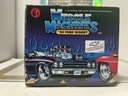 1/18: MUSCLE MACHINES RED ‘50 FORD WOODY image