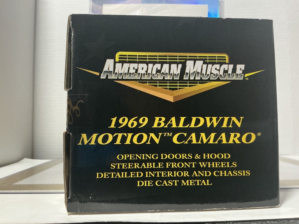 1/18: ERTL 1969 BALDWIN MOTION CAMARO ORANGE W/ WHITE STRIPES image