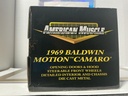 1/18: ERTL 1969 BALDWIN MOTION CAMARO ORANGE W/ WHITE STRIPES image