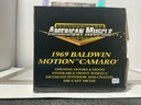 1/18: ERTL 1969 BALDWIN MOTION CAMARO ORANGE W/ WHITE STRIPES image