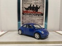 1/18: BURAGO ITALY 1998 VOLKSWAGEN NEW BEETLE BLUE ON GRAY image