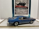 1/18: ERTL 1969 PONTIAC GTO JUDGE BLUE ON CREAM W STRIPE image