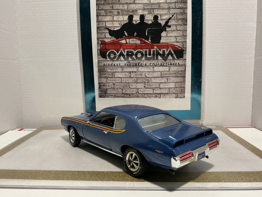 1/18: ERTL 1969 PONTIAC GTO JUDGE BLUE ON CREAM W STRIPE image