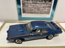 1/18: ERTL 1969 PONTIAC GTO JUDGE BLUE ON CREAM W STRIPE image