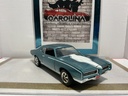 1/18: ERTL 1969 PONTIAC GTO ROYAL BODCAT CRYSTAL TURQUOISE ON BLACK image