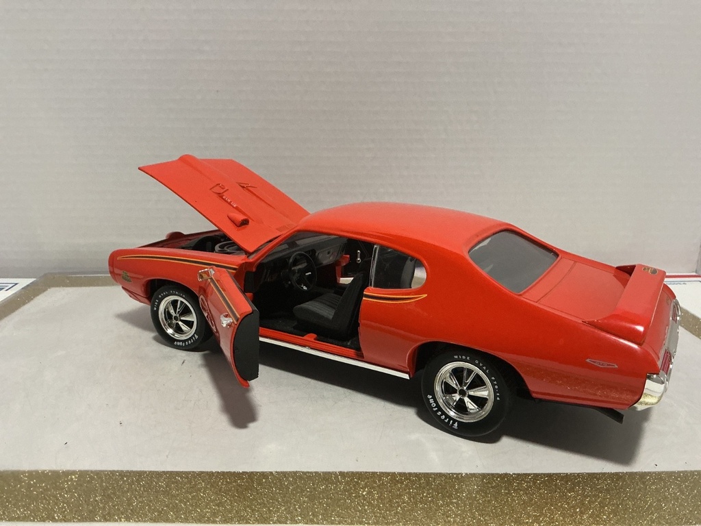 1/18: ERTL 1969 PONTIAC GTO JUDGE ORANGE ON BLACK image