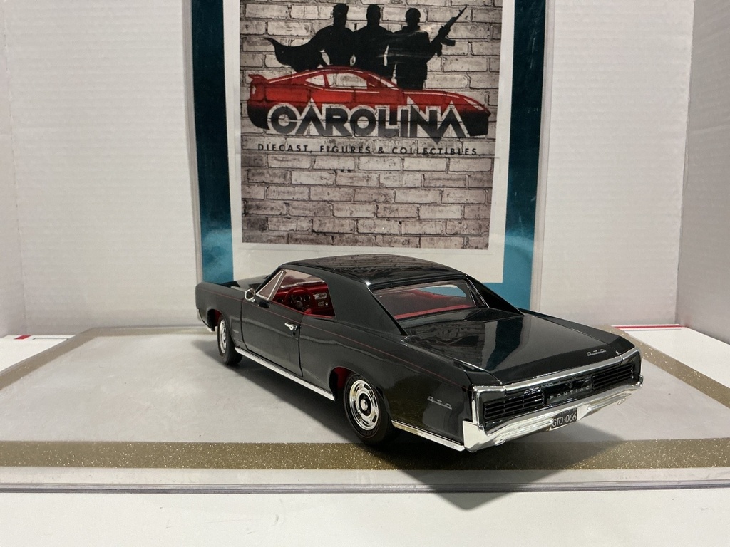 1/18: ERTL 1966 PONTIAC GTO BLACK ON RED image