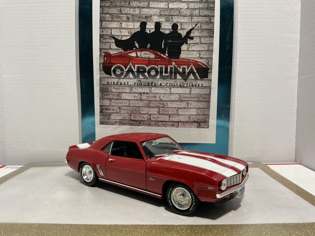 1/18: ERTL 1969 CHEVROLET CAMARO LE RED ON BLACK WITH WHITE STRIPE image