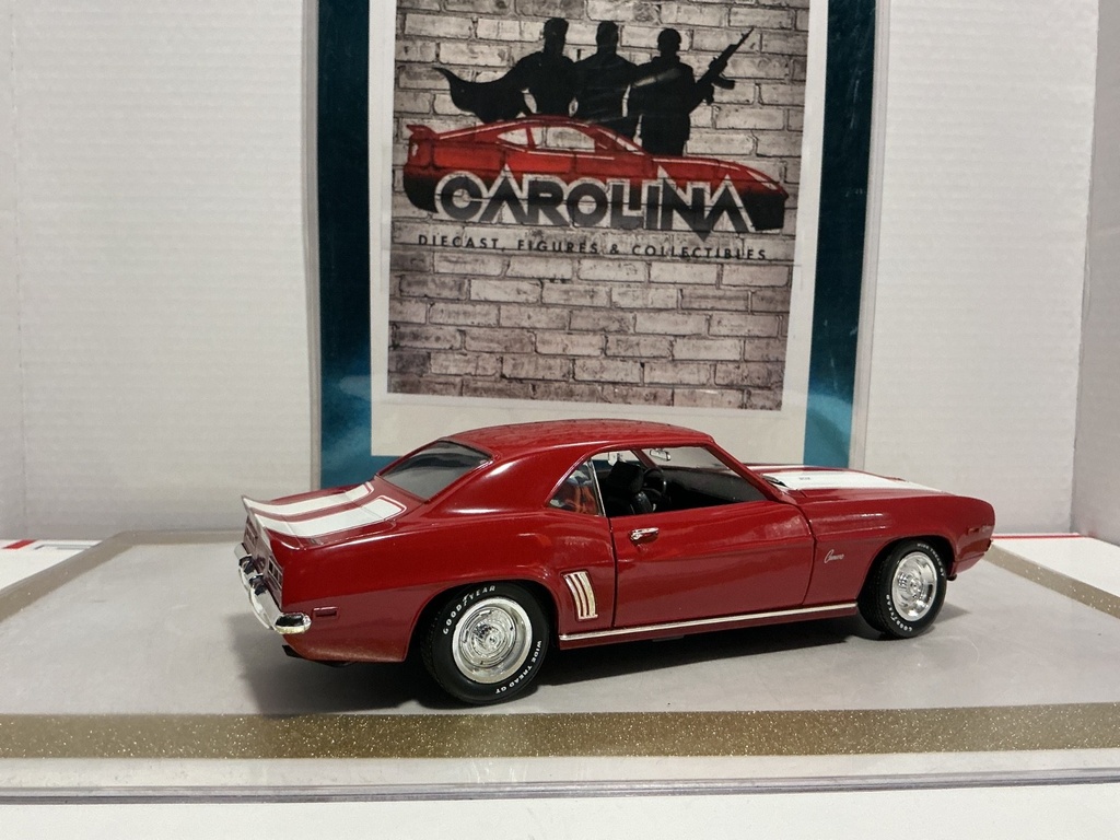 1/18: ERTL 1969 CHEVROLET CAMARO LE RED ON BLACK WITH WHITE STRIPE image