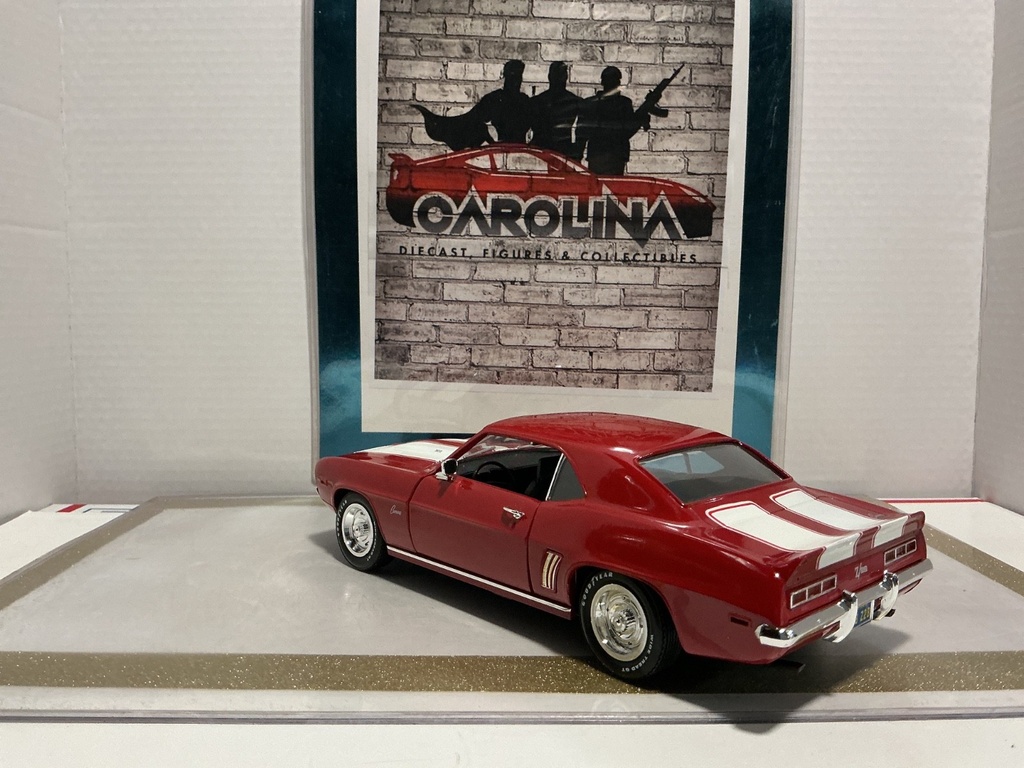 1/18: ERTL 1969 CHEVROLET CAMARO LE RED ON BLACK WITH WHITE STRIPE image