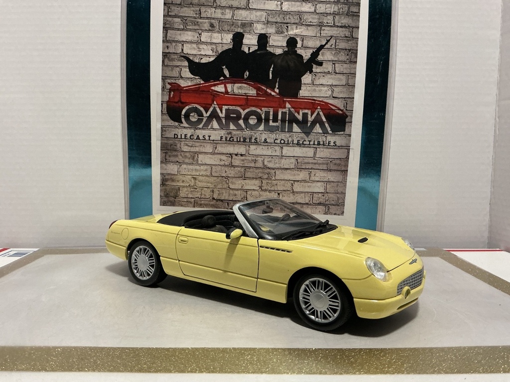 1/18: MAISTO 1999 FORD THUNDERBIRD YELLOW ON BLACK image