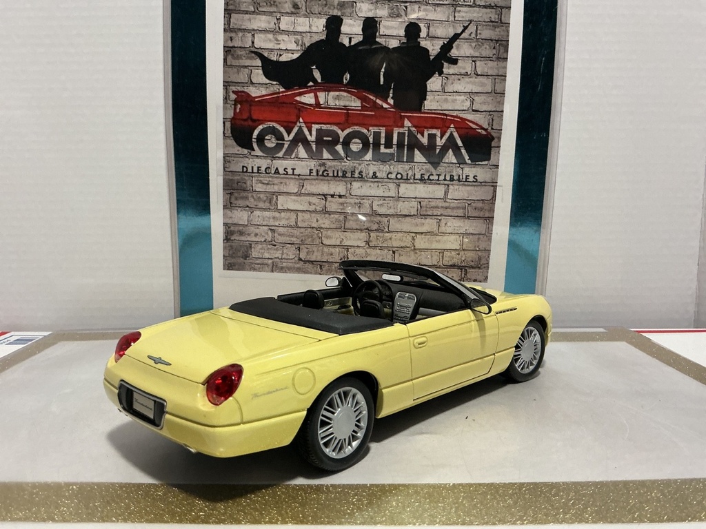 1/18: MAISTO 1999 FORD THUNDERBIRD YELLOW ON BLACK image
