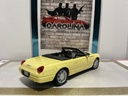 1/18: MAISTO 1999 FORD THUNDERBIRD YELLOW ON BLACK image