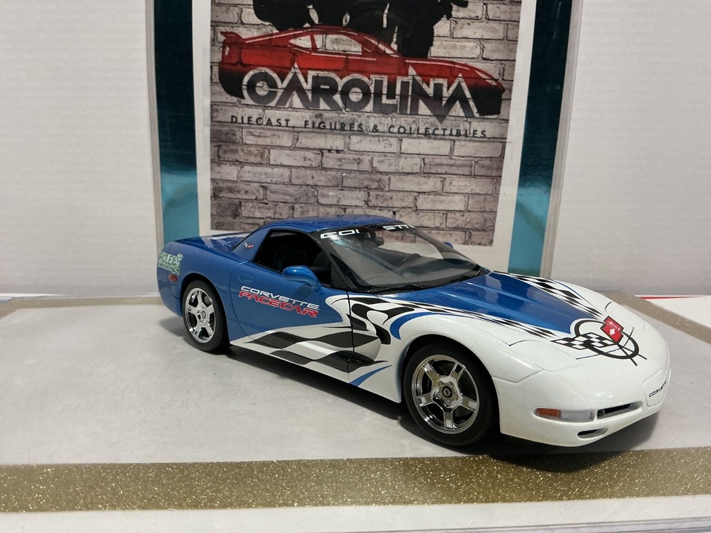 1/18: UT MODEL CHEVY CORVETTE ROLEX *CRACKS IN PAINT* BLUE AND WHITE ON BLACK image