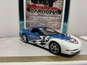 1/18: UT MODEL CHEVY CORVETTE ROLEX *CRACKS IN PAINT* BLUE AND WHITE ON BLACK image