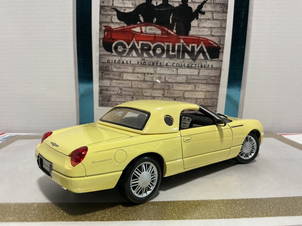 1/18: MAISTO 1999 FORD THUNDERBIRD YELLOW ON BLACK image