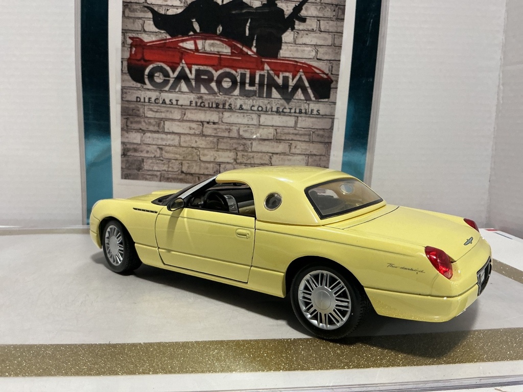 1/18: MAISTO 1999 FORD THUNDERBIRD YELLOW ON BLACK image