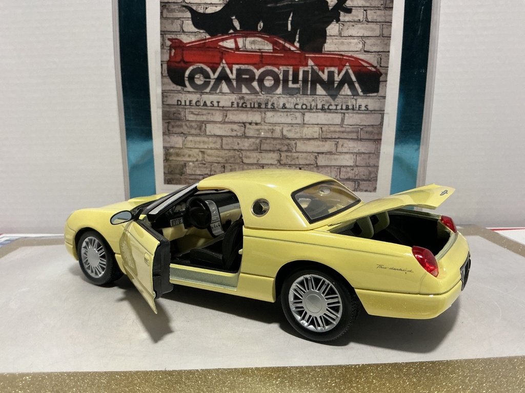 1/18: MAISTO 1999 FORD - THUNDERBIRD - YELLOW ON BLACK image