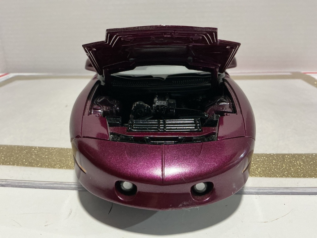1/18 ERTL 1996 PONTIAC TRANS AM PURPLE ON GREY *DOOR BROKEN image