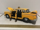 1/18 SUN STAR 1961 CHECKER A11 *BROKEN WHEEL/TIRE* YELLOW ON BLACK image