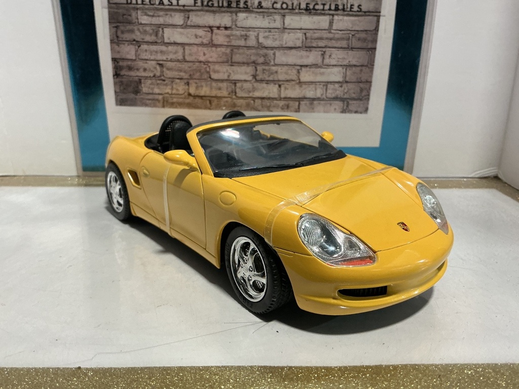 1:18 SOLIDO 1998 PROSHE BOXSTER YELLOW ON BLACK image