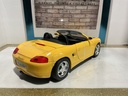 1:18 SOLIDO 1998 PROSHE BOXSTER YELLOW ON BLACK image
