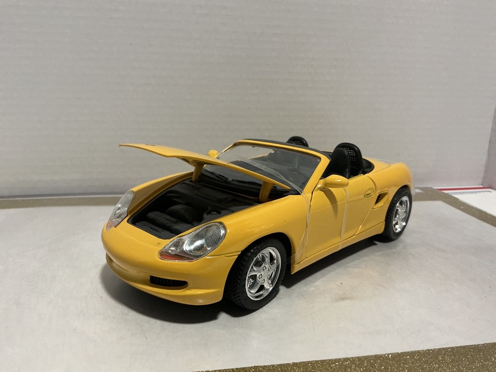 1:18 SOLIDO 1998 PROSHE BOXSTER YELLOW ON BLACK image