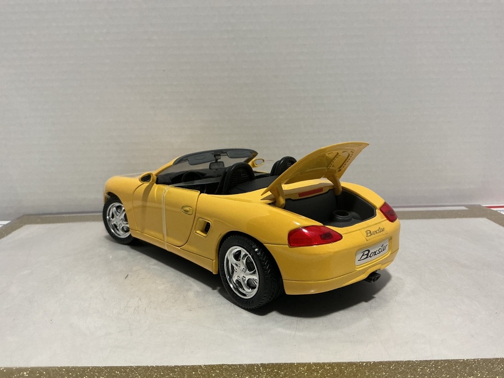 1:18 SOLIDO 1998 PROSHE BOXSTER YELLOW ON BLACK image