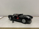 1:18 MAISTO PORSHE 550A SPYDER BLACK ON RED image